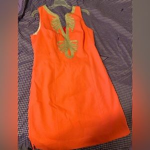 Lilly Pulitzer dress in neon coral. Size 14, NWT.